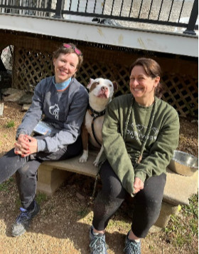 photo of dog named Chance on bench with 2 visitors